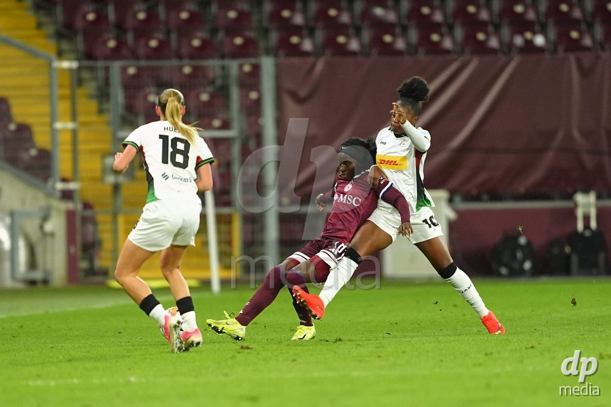 GENEVA, SWITZERLAND - OCTOBER 28: Benedicte Simon of Servette FC Chenois Feminin against Camille Lafaix of OH Leuven and Lily Hoekx of OH Leuven during the UEFA Women's Champions League match between Servette FC Chenois Feminin and OH Leuven at Stade de Geneve on October 28, 2026 in Geneva, Switzerland.