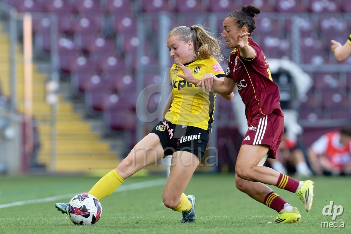 Geneva, Switzerland - May 29 : Noa Linn Munger of BSC YB Frauen in action (close up) under pressure of Paula Serrano Castano of Servette FC Chenois Feminin   during the AWSL Final Second Leg match between Servette FC Chenois Feminin  and BSC YB Frauen  at Stade de Geneve on May 29 , 2026 in Geneva, Switzerland.