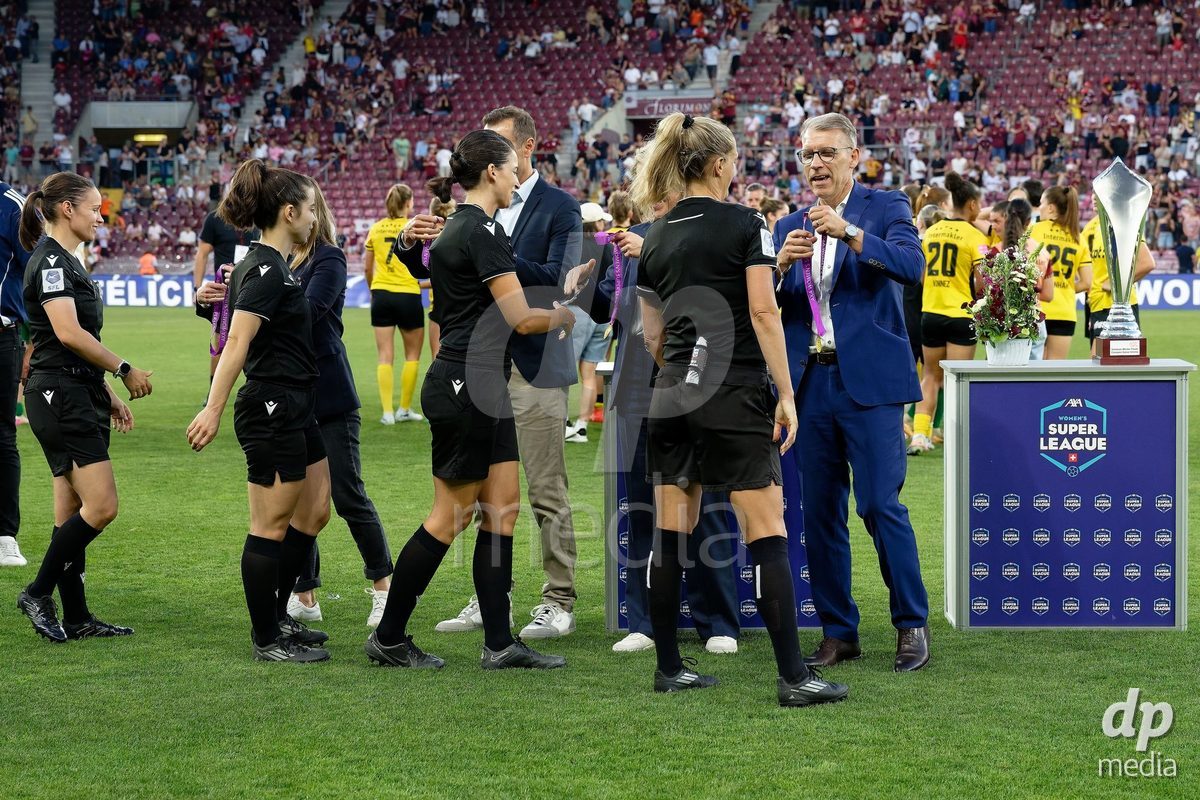 Geneva, Switzerland - May 29 : Desiree Blanco (Referee) Sabrina Keinersdorfer (Assistant Referee) Melissa Correia (Assistant Referee) Deborah Anex (Fourth Official) receive the medal from Peter Knabel President of ASF during the AWSL Final Second Leg match between Servette FC Chenois Feminin  and BSC YB Frauen  at Stade de Geneve on May 29 , 2026 in Geneva, Switzerland.