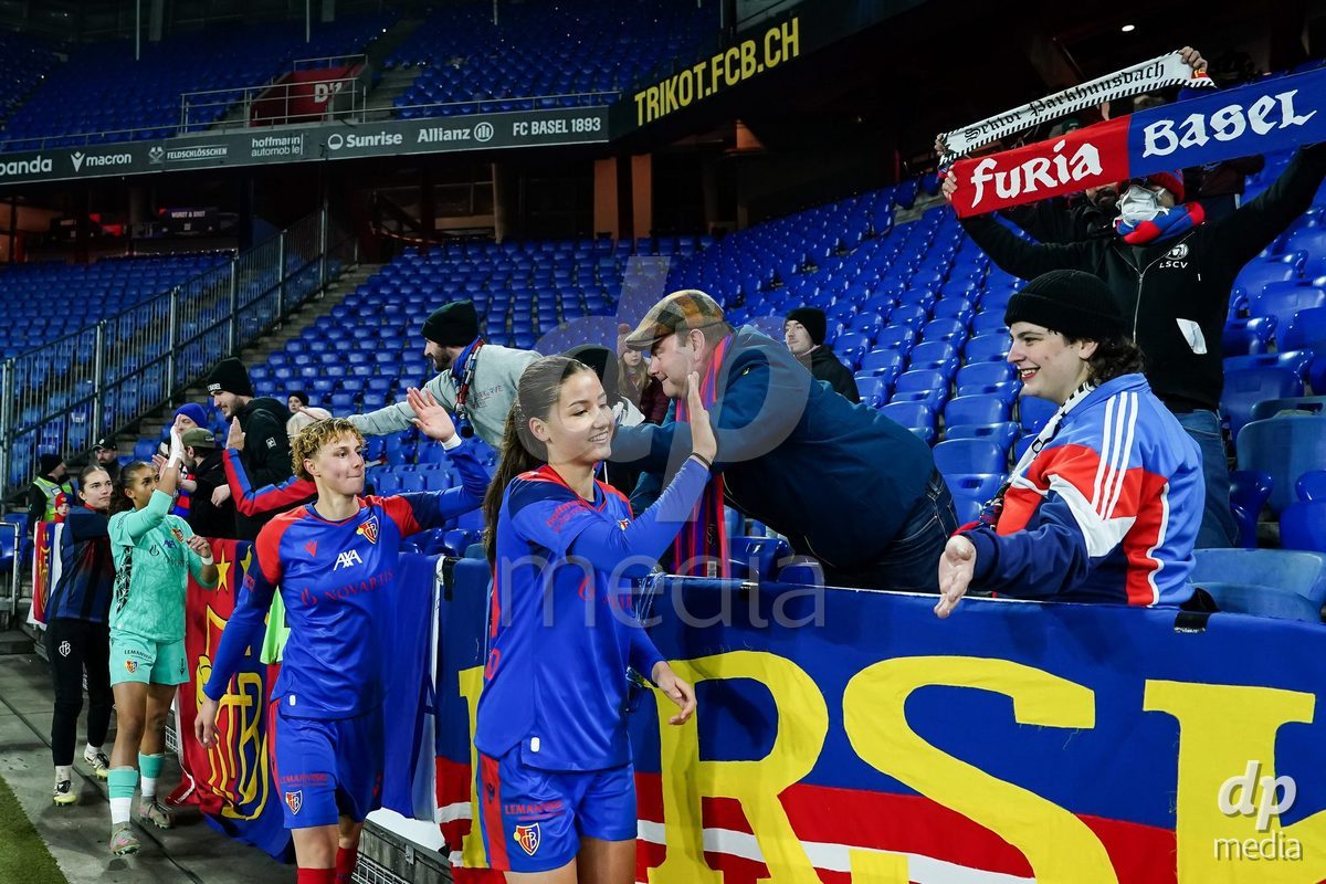 BASEL, SWITZERLAND - OCTOBER 30: Fans celebrate with players of FC Basel the victory during the AXA Women's Super League match between FC Basel 1893 and FC Zurich at St. Jakob-Park on October 30, 2026 in Basel, Switzerland.