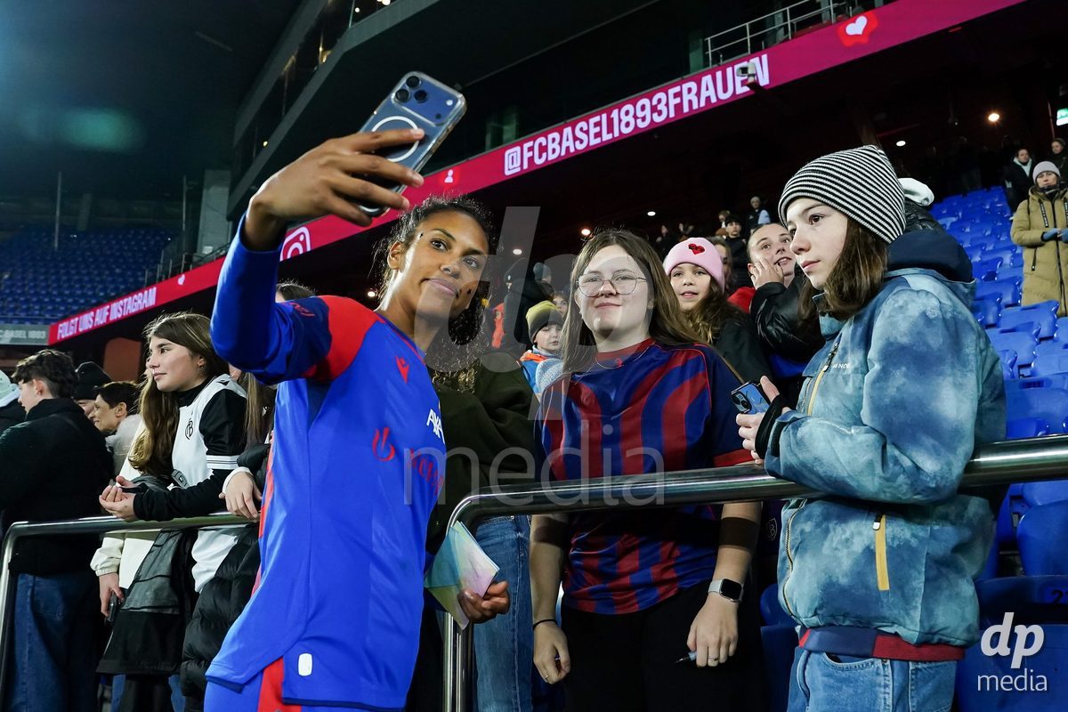 BASEL, SWITZERLAND - OCTOBER 30: Coumba Louisa Sow of FC Basel 1893 takes a selfie with fans after the victory during the AXA Women's Super League match between FC Basel 1893 and FC Zurich at St. Jakob-Park on October 30, 2026 in Basel, Switzerland.