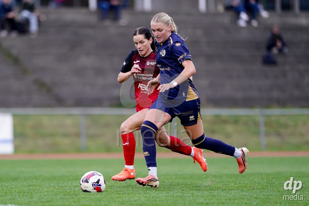 LUZERN, SWITZERLAND - OCTOBER 31: Romy Baraniak of FC Luzern and Tabea Dorothee Maria Schütt of FC Aarau Frauen battle for the ball during the AXA Women's Super League match between FC Luzern and FC Aarau Frauen at Hubelmatt on October 31, 2026 in Luzern, Switzerland.