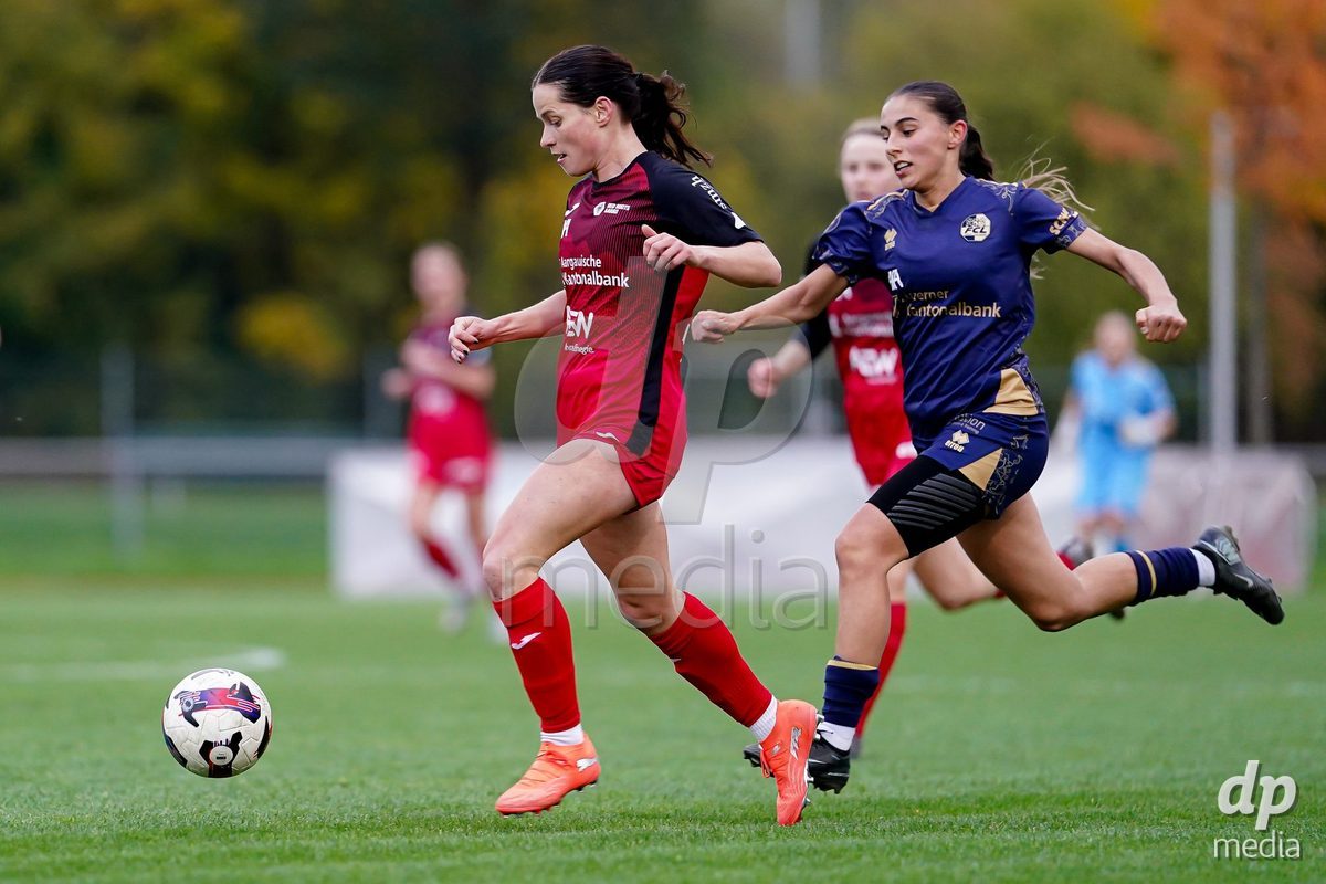 LUZERN, SWITZERLAND - OCTOBER 31: Tabea Dorothee Maria Schütt of FC Aarau Frauen and Francesca Studer of FC Luzern battle for the ball during the AXA Women's Super League match between FC Luzern and FC Aarau Frauen at Hubelmatt on October 31, 2026 in Luzern, Switzerland.