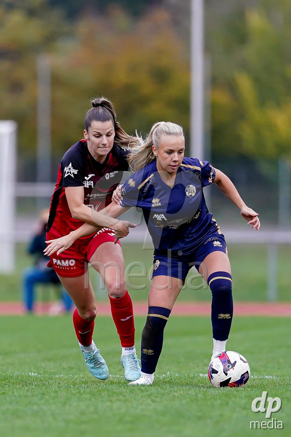 LUZERN, SWITZERLAND - OCTOBER 31: Jennie Marie Egeriis of FC Luzern and Celia Hofer of FC Aarau Frauen battle for the ball during the AXA Women's Super League match between FC Luzern and FC Aarau Frauen at Hubelmatt on October 31, 2026 in Luzern, Switzerland.
