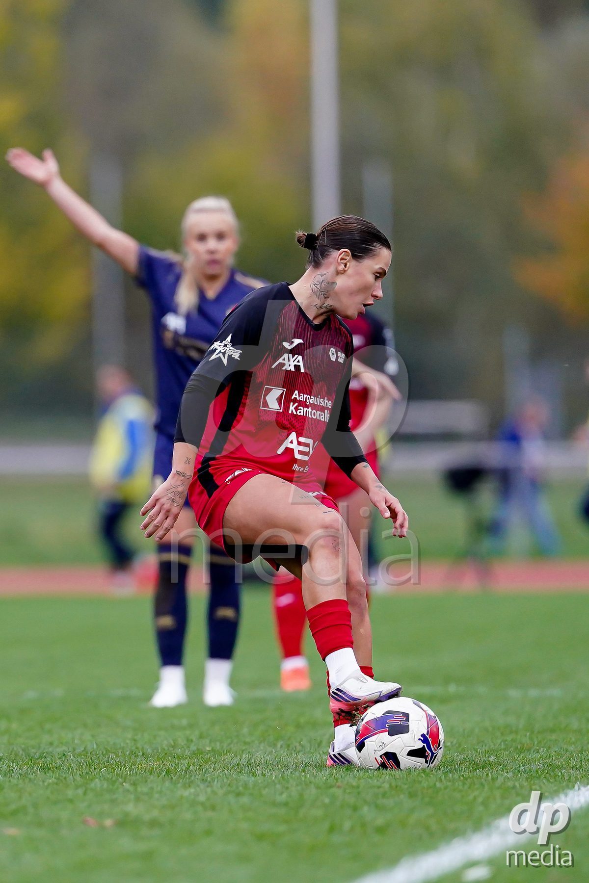 LUZERN, SWITZERLAND - OCTOBER 31: Vanesa Hoti of FC Aarau Frauen controls the ball during the AXA Women's Super League match between FC Luzern and FC Aarau Frauen at Hubelmatt on October 31, 2026 in Luzern, Switzerland.
